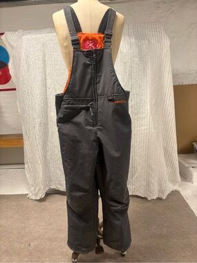 Arctix Kids Gray Bib Snow Pants with Orange Lining
Size Youth M